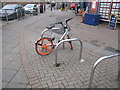 TQ1981 : Dockless hire bike on public parking stand by David Hawgood