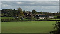 View to Manor House Farm from bridleway through Willoughbridge Park