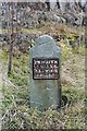 NY4327 : Old Milestone by the former A66 in Penruddock by CF Smith