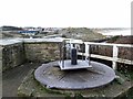 NZ3376 : Iron turntable above Seaton Sluice Harbour by Andrew Curtis