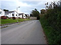 Housing on the outskirts of Poughill