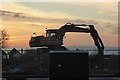 Digger in silhouette