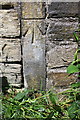 Benchmark on gatepost in wall beside Leeds & Liverpool Canal