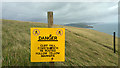 SY8480 : Warning sign on the coast path above Mupe Bay, Lulworth Ranges by Phil Champion