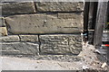 Benchmark on Canal Road wall at former entrance