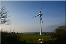 SS8121 : North Devon : Grassy Field & Wind Turbine by Lewis Clarke