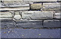 Benchmark on Keighley Road wall