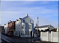 Houses and shops at the SW end of Downs Road