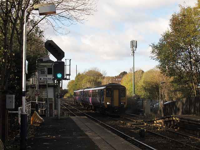 Romiley station: train arriving from Manchester