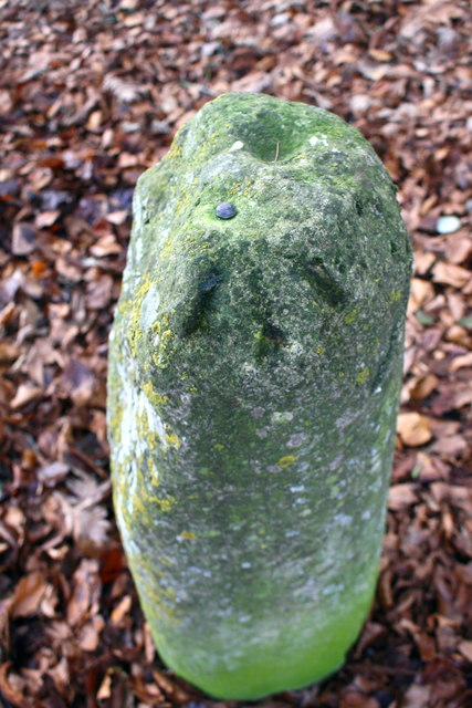 Benchmark on old milestone near St Giles's Church