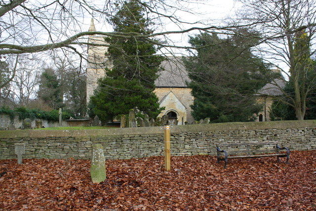 St Giles's Church and old milestone