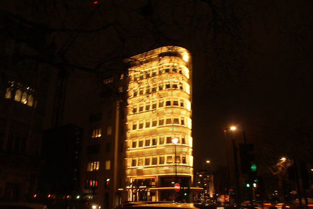 View of 45 Park Lane illuminated at night