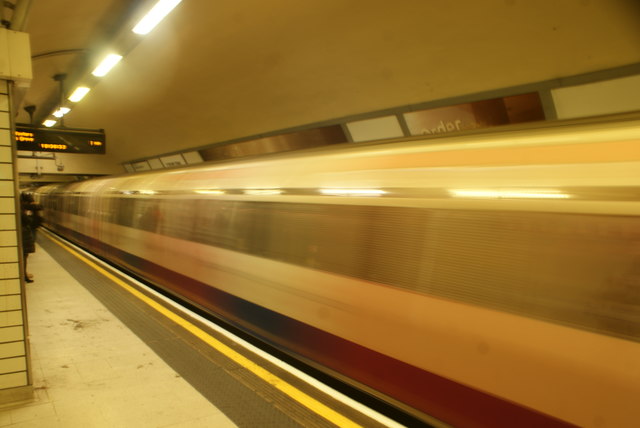Long exposure of a Piccadilly line train leaving Leicester Square station