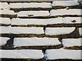 Snow on a cold stone roof