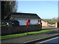 Elizabeth II postbox on Station Road, Newland