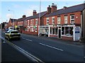 SJ3057 : Alyn Carpets shop, High Street, Caergwrle, Flintshire by Jaggery
