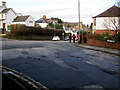 Patchy road surface, Woodfield Avenue, Radyr, Cardiff