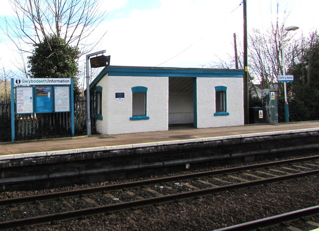 Passenger shelter and information boards on platform 2, Cefn-y-bedd station, Flintshire