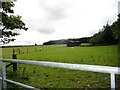 Stables in a field