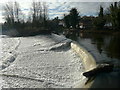 SK3538 : Foam on the river Derwent downstream of the weir at Darley Mills by Humphrey Bolton