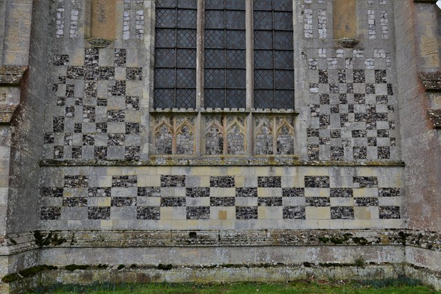 Burnham Thorpe, All Saints Church: The east wall with its fine flushwork