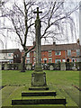 TG2310 : The War Memorial cross at New Catton by Adrian S Pye