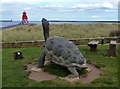 Tortoise sculpture near the Little Haven Hotel