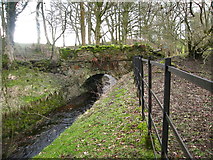 SJ2748 : Small stone bridge over watercourse by Maggie Cox