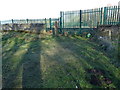 Former camp entrance/level crossing