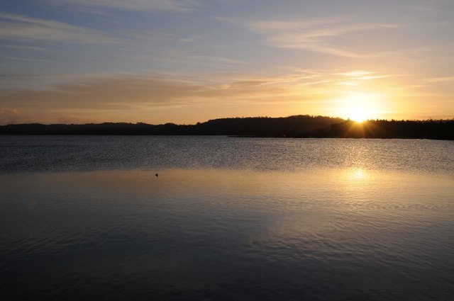The sun rising over Chew Valley Lake