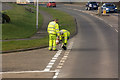 White line marking a junction with the B3233