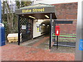 Queen Elizabeth II postbox at an entrance to Blake Street railway station, Sutton Coldfield