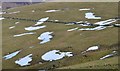 NT2545 : Snow patch patterns, Cavarra Hill by Jim Barton