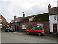 TA0953 : Cottages, Main Street, North Frodingham by Jonathan Thacker