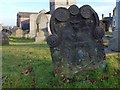 NS7993 : The Kirkyard: 1698 gravestone by Lairich Rig