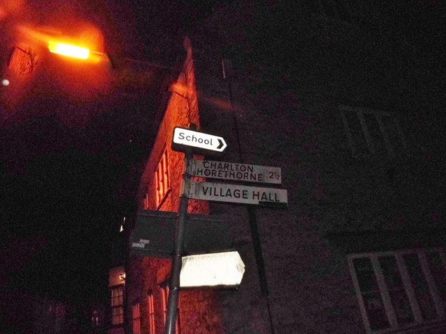 Collection of signs on North Street, Milborne Port