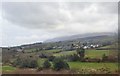 View across the Burren Valley to the village of Burrenbridge