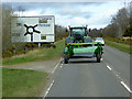 NH6052 : Tractor on the A832 at Tore by David Dixon