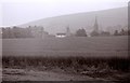 Falkland seen across fields from the A912