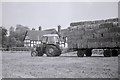 Loaded trailer and tractor, Bridge End Farm, Davenham