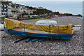 Covered boat on the beach