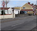 Warning signs alongside Cliff Terrace, Burry Port