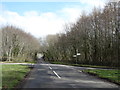 Road junction by Keepers Wood