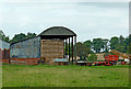 SP4578 : Dutch barn at Hungerfield in Warwickshire by Roger  Kidd
