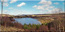 NH7036 : Lochan on the Edge of Mid Lairgs Quarry by valenta