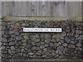 TM5077 : Halesworth Road sign by Geographer
