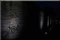 TQ2681 : View of spotlights playing on the basement wall of a house on Warwick Crescent from the canal towpath by Robert Lamb
