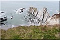 SS4646 : Rocks below Bull Point Lighthouse, Devon by Derek Voller