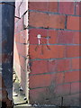 Bench mark on former Liberal Reform Club, Stockport