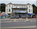 Three businesses on the north side of the Esplanade, Exmouth